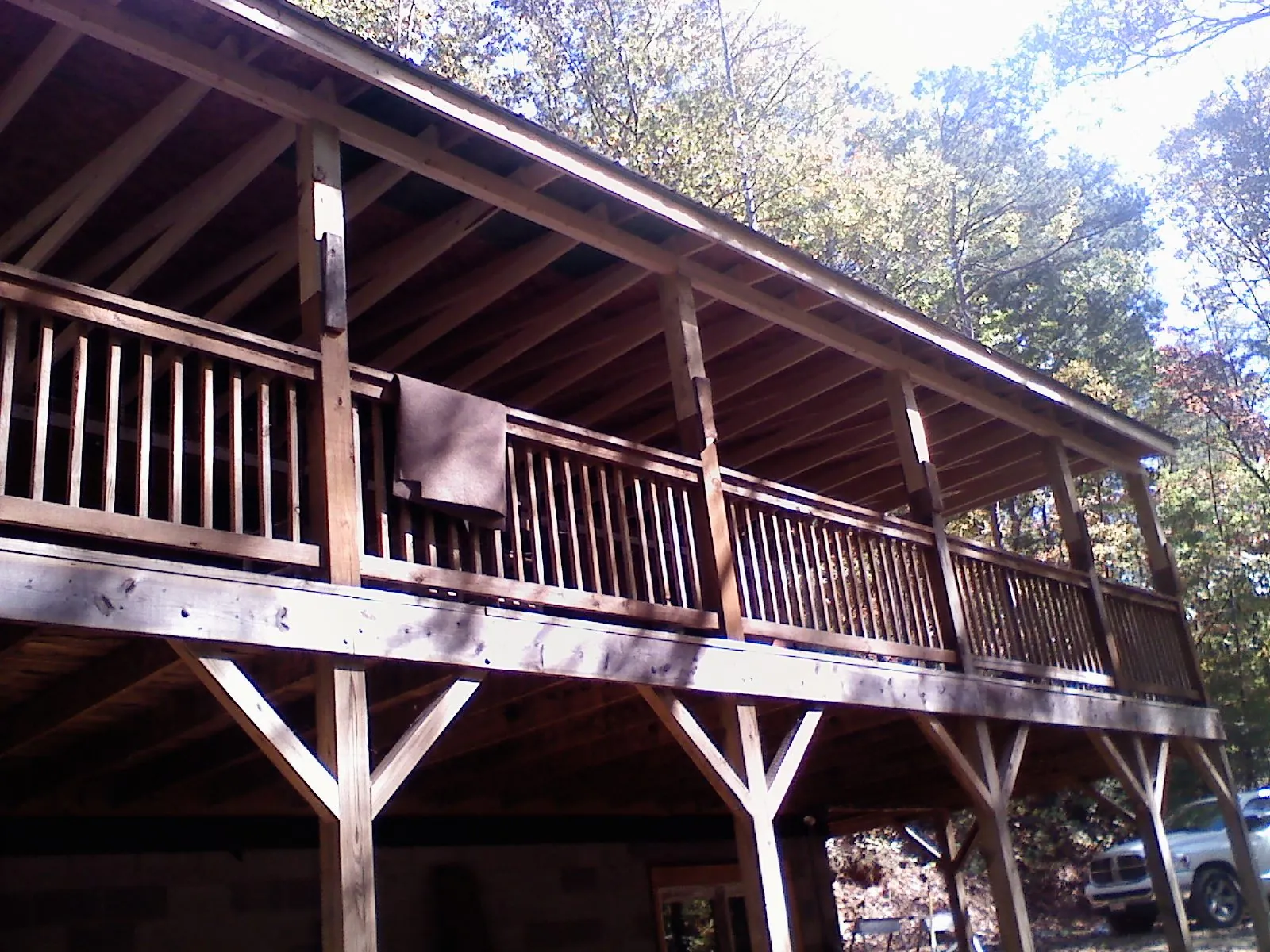 Timber framing under a new elevated porch and deck — Roof Leak Repair in Asher by Roofing Brothers